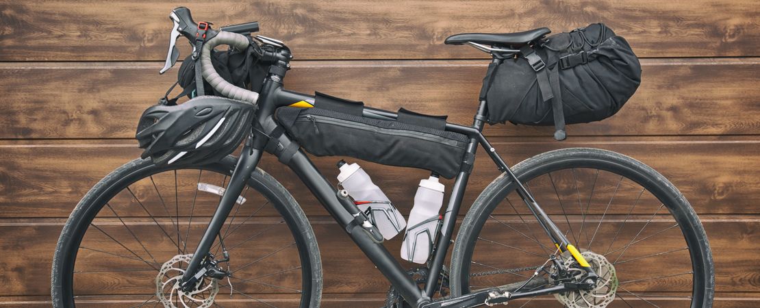 The bicycle packed with a lot of bags and other equipment ready for adventure and travel